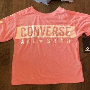 This is a pink converse shirt